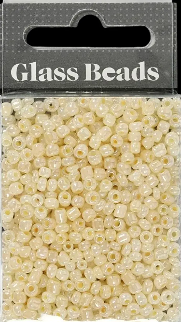 Ei merkkiä Askartelutarvikkeet>Rocaille-Siemenhelmet, Norsunluu, Halk. 3 Mm, Koko 8/0 , Aukon Koko 0,6-1,0 Mm, 25 G/ 1 Pkk